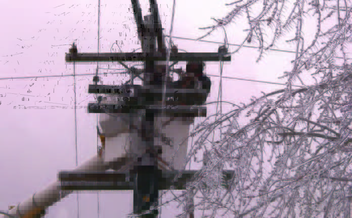 A Piqua crew works to restore service after a February 2009 ice storm hit nonmember Madisonville, Kentucky Other AMP Mutual Aid members assisting were Bowling Green, Hamilton, Napoleon, Tipp City, Wapakoneta and Westerville. St. Clairsville assisted American Electric Power