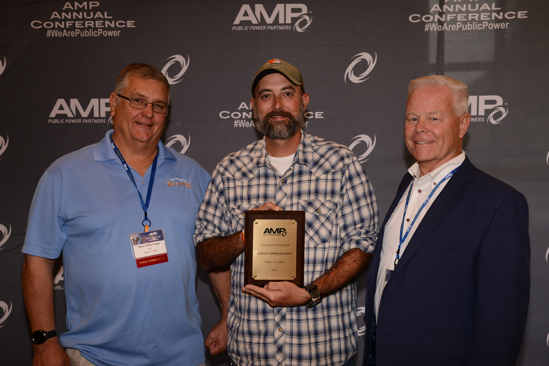 Grafton Mayor Dave DiVencenzo; Ben Palazzi, electric department lead lineman; and Joe Price, village administrator accept the Safety Commendation during the AMP Annual Conference.