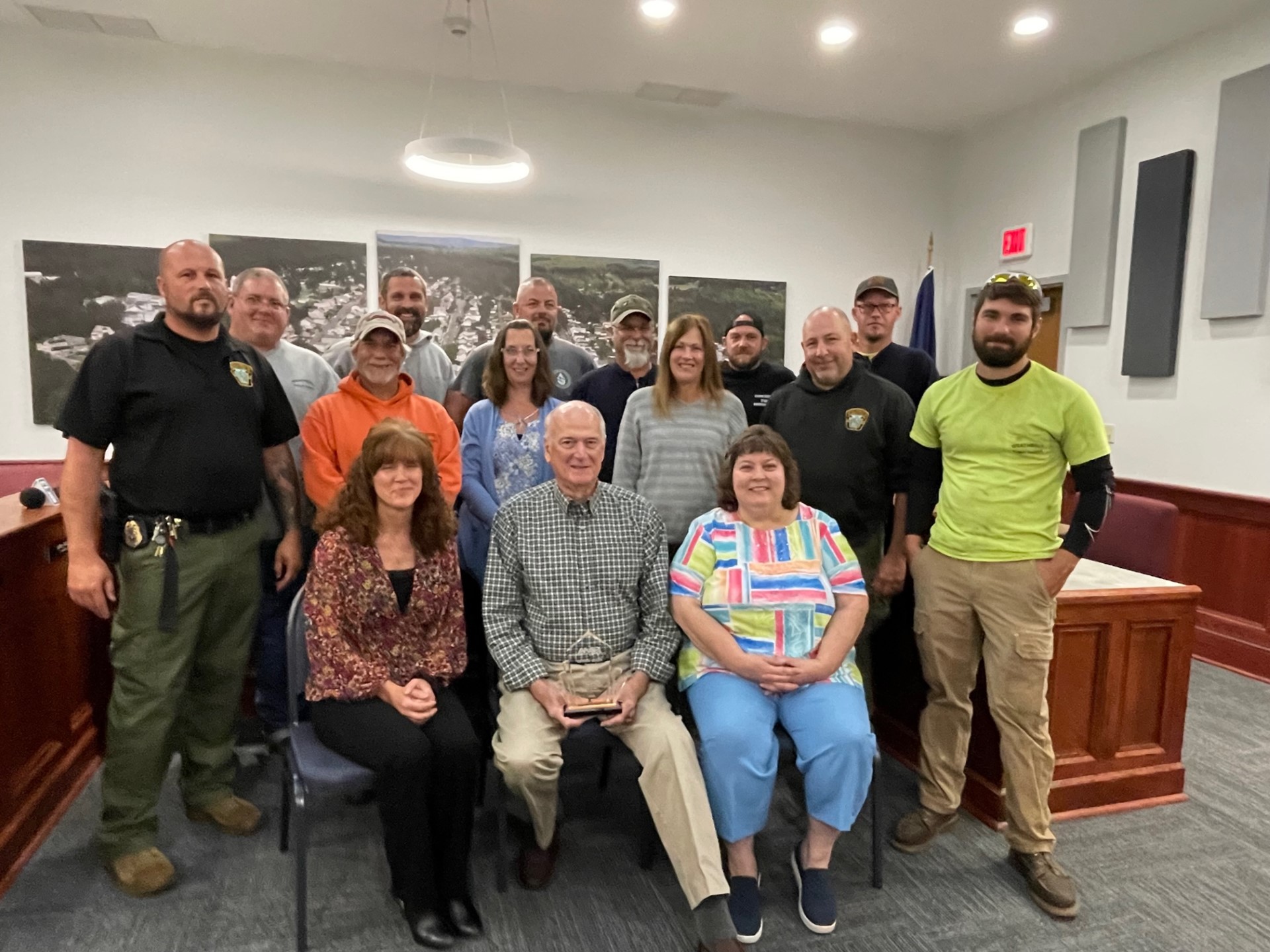 Harold Pudliner accepts the 2023 AMP Seven Hats Award during a surprise ceremony with borough staff members. He was informed of his selection for the award by Jeff Brediger, Orrville Director of Utilities and former Chair of the AMP Board of Trustees.